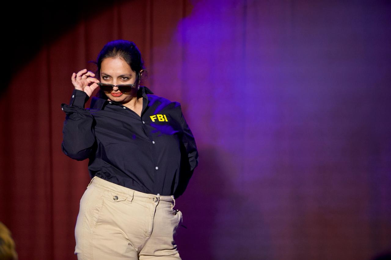 Shaili on stage doing improv theatre